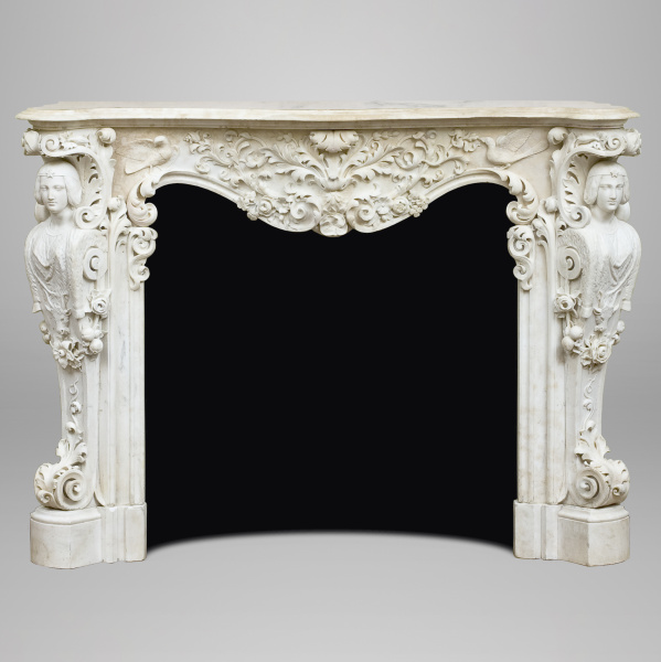 Мраморный каминный портал с кариатидами в стиле барокко