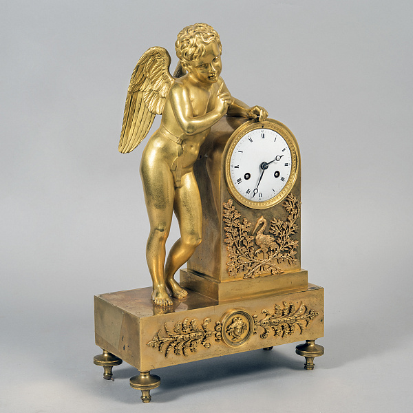 Французские кабинетные часы с фигурой Амура в стиле ампир